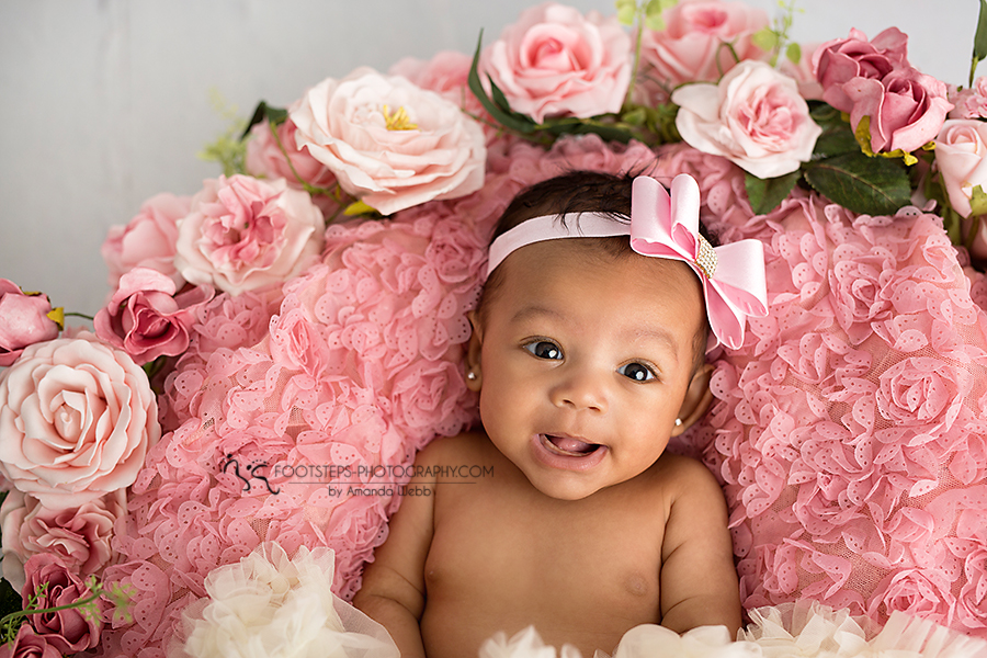 baby photographer Vacaville smiling pink girl