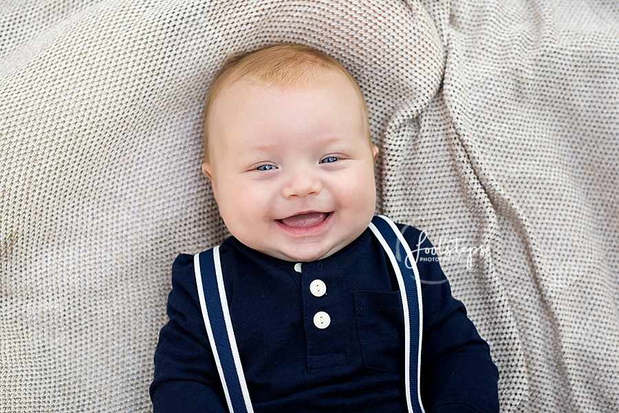 smiling three month old